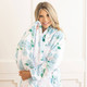 Front angle view of women’s hydrangea floral plush robe with tie waist and soft texture