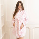 8 Oak Lane women’s pink toile plush robe with tie waist and relaxed fit (front view)