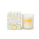 Magnolia fig candle with mint and green botanical packaging in glass jar (product view)