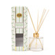 Styled bathroom display with magnolia fig reed diffuser and coordinating bath products in mint packaging