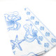 Sea salt kitchen towels with blue ocean-inspired pattern including shells and sea life (angled view)