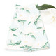Magnolia mint kitchen towel styled with magnolia flowers showing green botanical design
