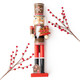 Hand-painted wood nutcracker dressed as a gingerbread character holding a cookie tray, styled with berries