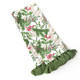 Woodland Berry print kitchen towel with green tassel trim, styled with a pinecone and berry sprig (alternate angle)