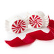 Two ceramic salt and pepper shakers shaped like wrapped peppermint candies with red swirl centers (styled detail view)