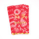 Red toile print paper guest towel with a gold foil script and scalloped edge