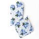 Holiday Chinoiserie oven mitt and pot holder set with a blue floral and bow print
