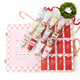Peppermint Toile advent calendar with 12 numbered compartments holding assorted mini hand creams