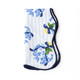 Holiday Chinoiserie scalloped dinner napkin with a blue floral and bow print