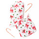 Holly Jolly Bows oven mitt and potholder set with red bows and candy canes on white (alternate angle)