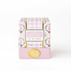 Frosted Sugarplum boxed soy candle in a pink gingham and floral print with a frosted glass vessel (alternate angle)