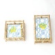 Blue lattice paper beverage napkin with lemon branches and a gold foil scalloped edge (styled detail view)
