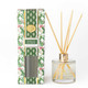 Woodland Cranberry reed diffuser with reed sticks in a holly and greenery print box