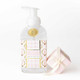 Frosted Sugarplum foaming hand soap pump bottle in a pink gingham nutcracker print (styled detail view)