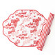 Santa Toile reversible scalloped placemat with a red village toile print and red striped reverse side