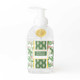 Woodland Cranberry foaming hand soap pump bottle in a holly and greenery print (styled detail view)