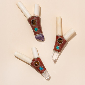 Bone kuripe applicators with crystal accents displayed together for ceremonial hapé use