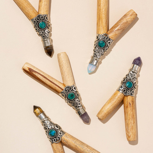 Palo Santo kuripe with silver and crystal accents displayed together for ceremonial hapé use