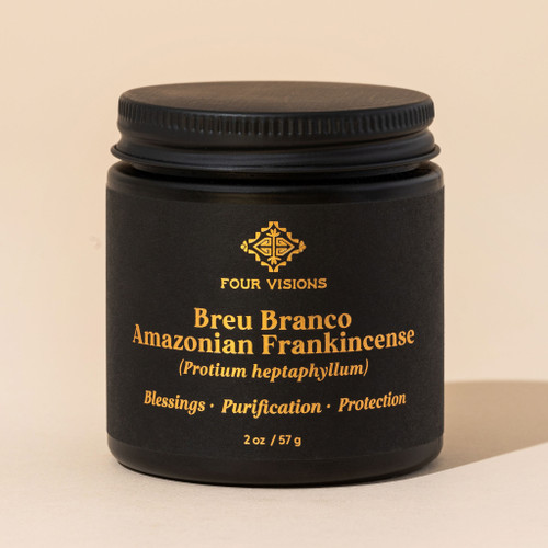 Breu Branco incense resin in glass jar on beige background