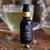 Copaiba extract dropper adding liquid to mocktail
