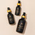 Sejé hair oil bottles in 1 oz, 2 oz, and 4 oz sizes