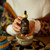 Ambi Sacha tincture dropper bottle held in hand