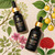 Warmi Killa tincture bottles in 1 oz and 2 oz sizes with ingredient illustrations including pau d’arco, birthwort, abuta, uchuva, and flor de palo cruz