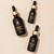Suma Causay tincture bottles in 0.5 oz, 1 oz, and 2 oz sizes