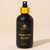 Munay healing lotion black bottle product shot