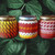 Three beaded medicine jars close-up showing beadwork detail