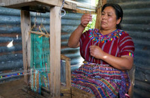 image of Guatemalan woman weaving our collars.