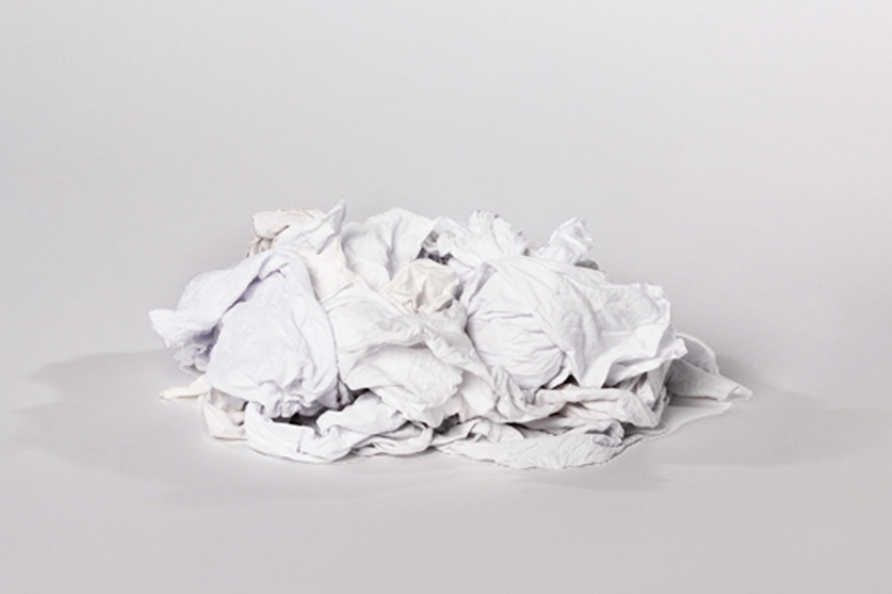 Cloth rag with stains on white background. Stock Photo