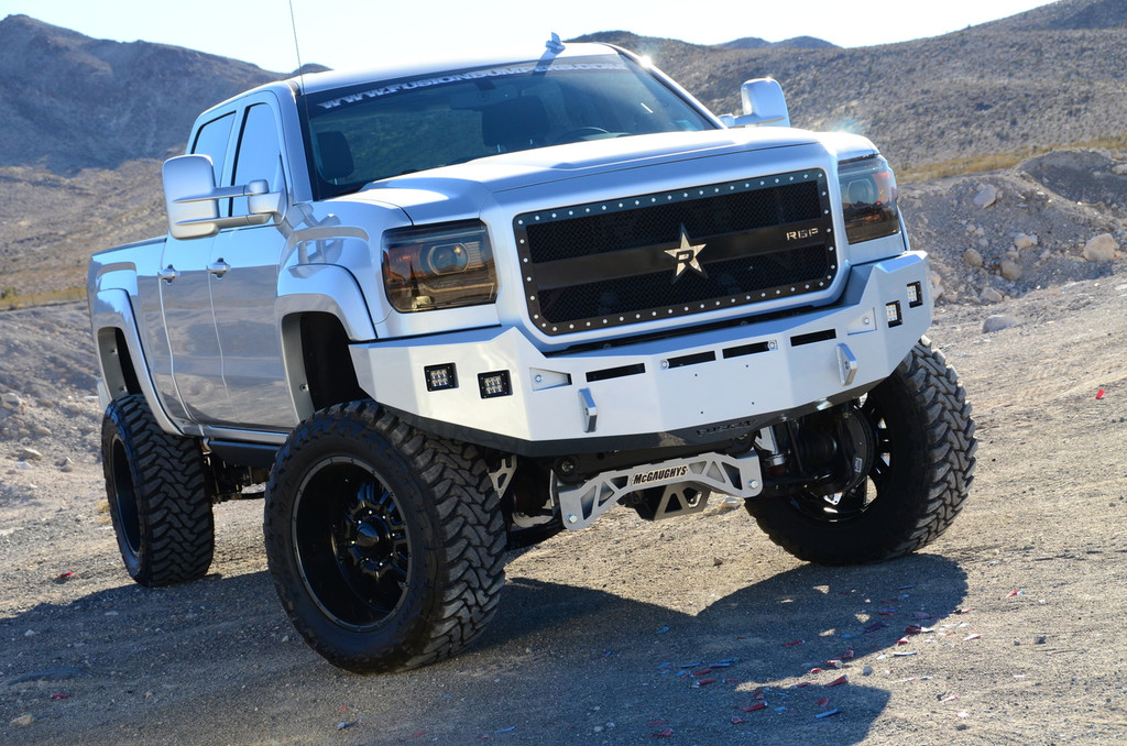 Base Bumper With Parking Sensor Mounts. 
Clevis Mounts.
Two Rigid Industries Dually's per side.