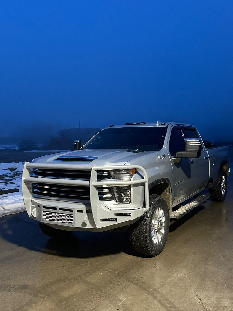 Base Bumper
Clevis Mounts
Front Parking Sensors
Fog Light Mounts-Rigid 6" Single Row lights (Staggered)
Block heater option. 
Center vent with stainless steel mesh insert
Defender Grill Guard with Headlight Guards