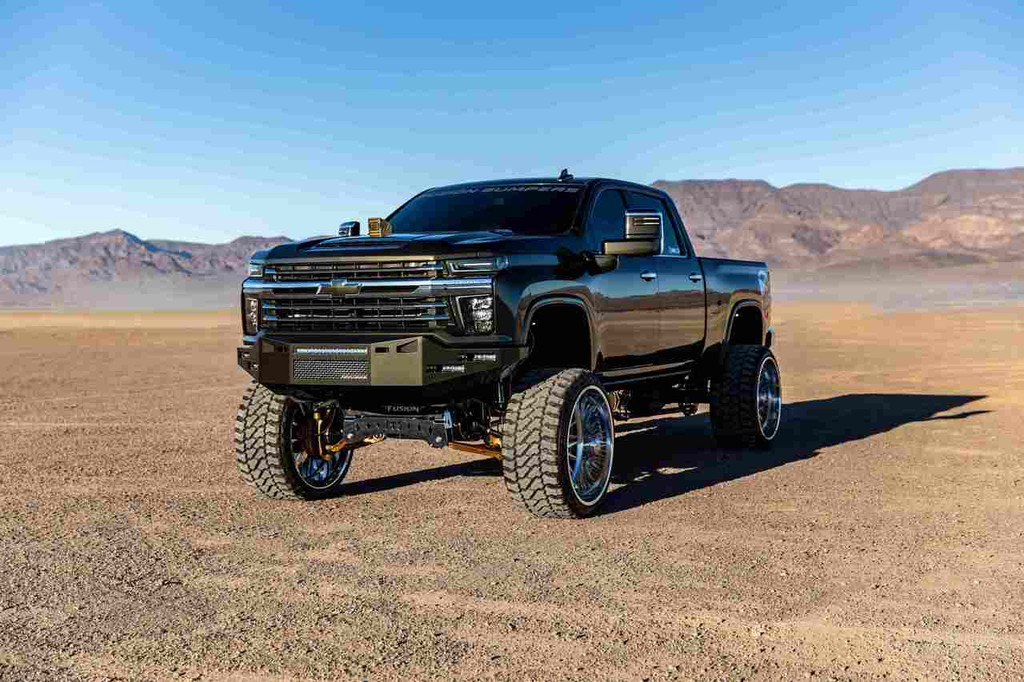 Base Bumper
Fog Light Mounts-Rigid 6" Single Row lights (Staggered)
20" Single Row light in the vent area. 
Block heater option. 
Center vent with stainless steel mesh insert