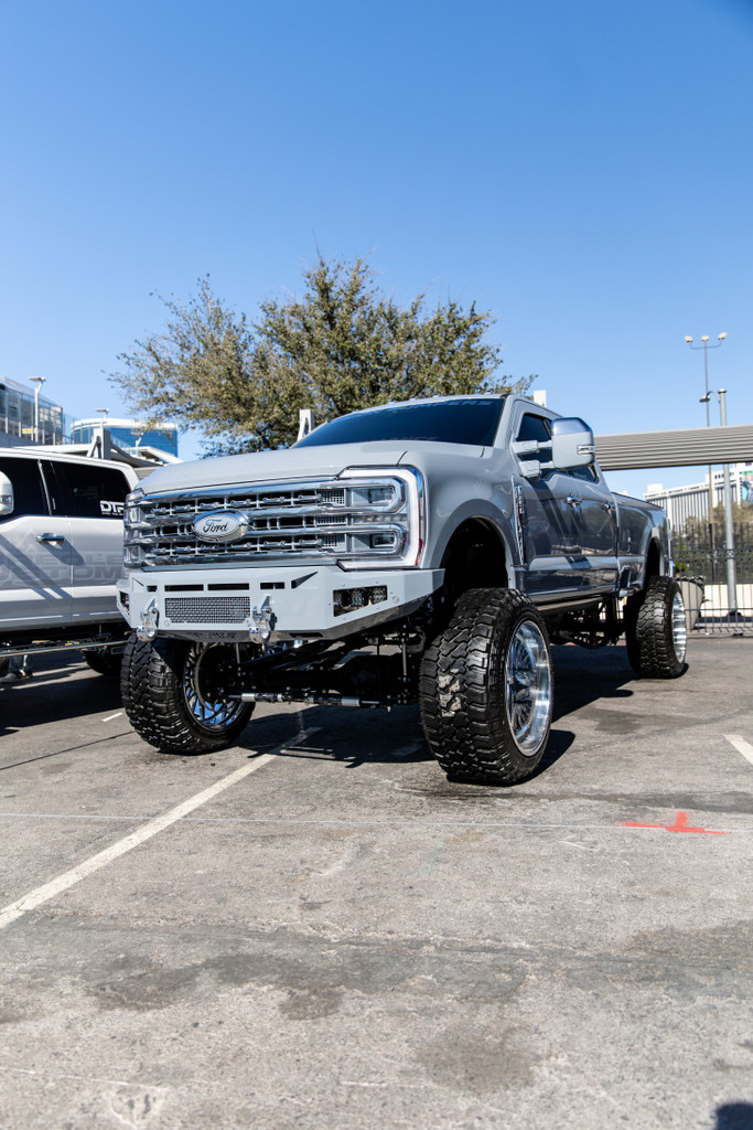 *NEW DESIGN*
Light Buckets for Fog Lights
Two 3" Cube Lights (Only option)
Clevis Mounts.
20" Single Row Light in vent area.
Adaptive Cruise Control
Front Parking Sensors