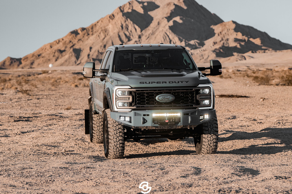 *NEW DESIGN*
Light Buckets for Fog Lights
Two 3" Cube Lights (Only option) Baja Design Squadron 
Clevis Mounts.
20" Single Row Light in vent area.
Adaptive Cruise Control
Front Parking Sensors
Factory Ford Winch Provision