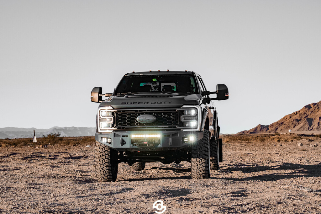 *NEW DESIGN*
Light Buckets for Fog Lights
Two 3" Cube Lights (Only option) Baja Design Squadron 
Clevis Mounts.
20" Single Row Light in vent area.
Adaptive Cruise Control
Front Parking Sensors
Factory Ford Winch Provision