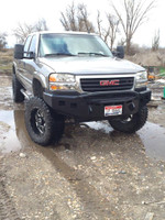 Base Front Bumper: Two 3" cube lights per side. Pre-runner bar/Bull Bar. Clevis mounts