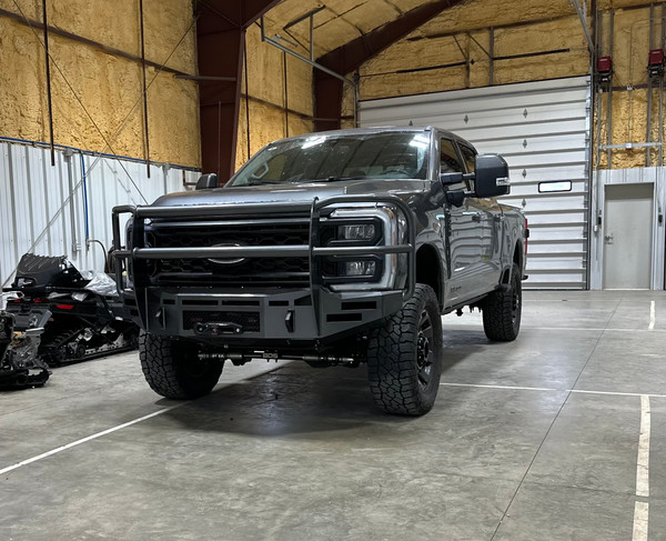Clevis Mounts.
Defender Grill Guard.
Radius Tubing.
Rigid 6" SR Mounts, Staggered.
Winch Mount.
Warn Evo 12000 S Winch. 
Adaptive Cruise Control Mount.
License Plate Center Mesh.
Front Parking Sensors.
