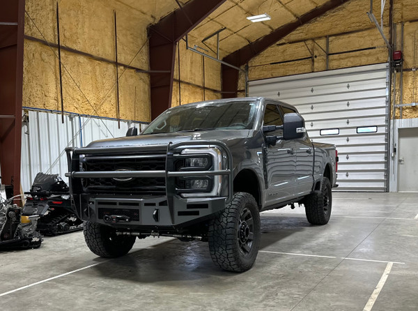 Clevis Mounts.
Defender Grill Guard.
Radius Tubing.
Rigid 6" SR Mounts, Staggered.
Winch Mount.
Warn Evo 12000 S Winch. 
Adaptive Cruise Control Mount.
License Plate Center Mesh.
Front Parking Sensors.
