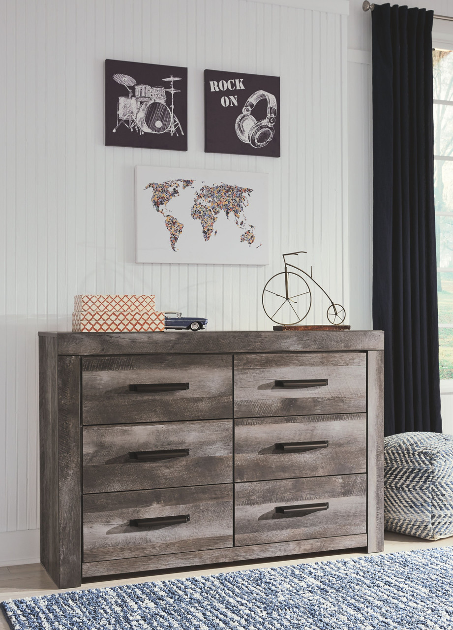 The Wynnlow Gray Six Drawer Dresser is available at Select Furnishings
