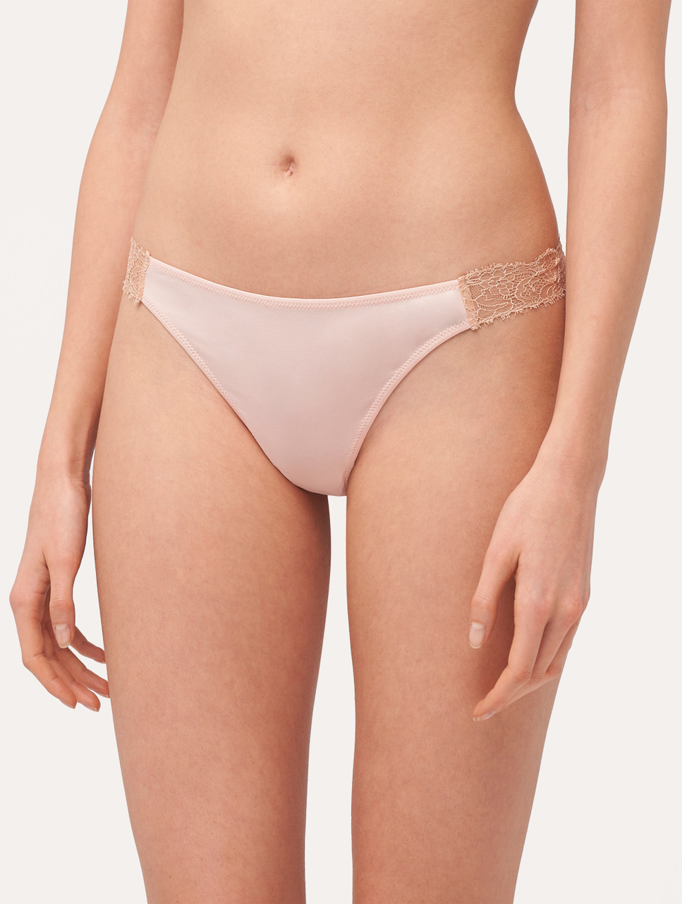 Tanga de encaje en rosa empolvado y arena