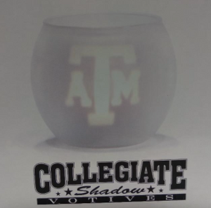 Frosted candle holder features an inner votive candle holder printed with ATM blocks

Shadow of ATM blocks visible when candle is lit

Includes one tea light candle