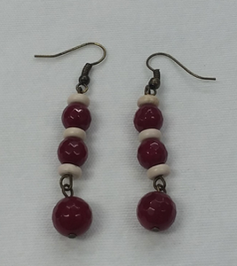 Maroon & White jade earrings designed by Carol Su.

2 1/4" in length with brass fish hook

Handmade in Texas.