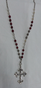 33" Asymmetrical hammered cross necklace.
Made of maroon jade, metal, and crystal beads. 
Handmade in Texas by Carol Su.