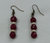 Maroon & White jade earrings designed by Carol Su.

1 3/4" in length with brass fish hook

Handmade in Texas.