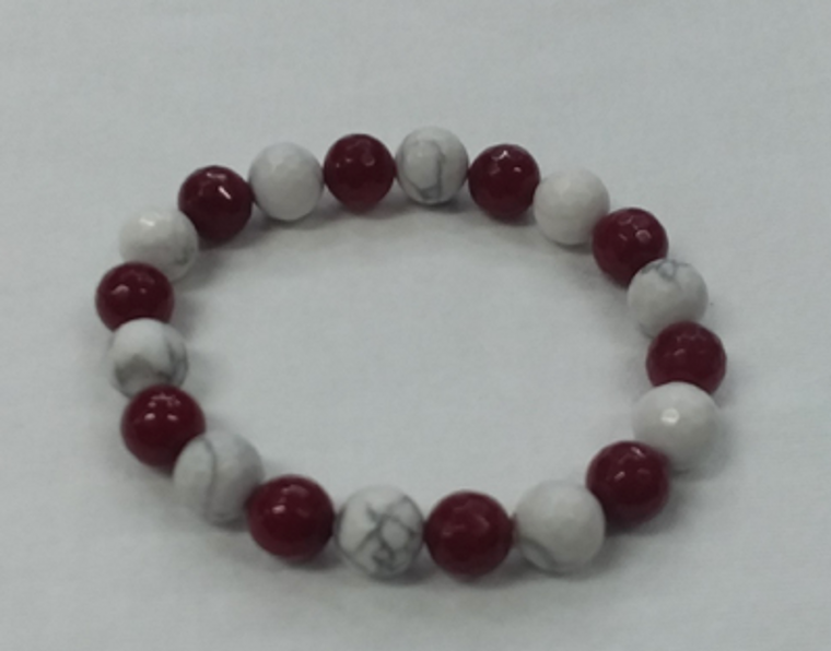 Textured white turquoise and maroon jade bracelet.

Standard size-fits most.

Handmade in Texas by Carol Su.