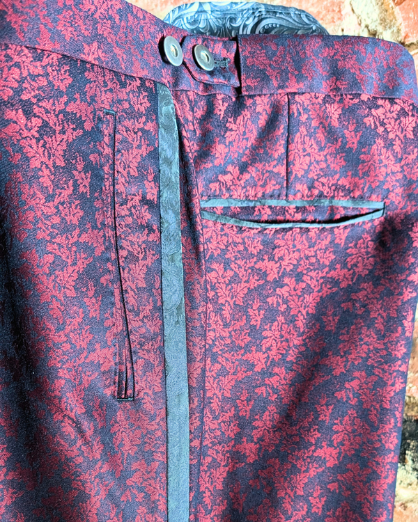 Obsidian - maroon leaf print tuxedo pants with black paisley contrast