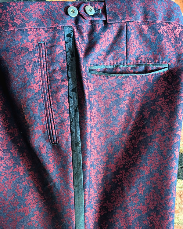Obsidian - maroon leaf print tuxedo pants with black paisley contrast